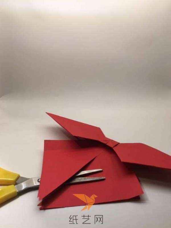 How to make an origami bow from a piece of paper