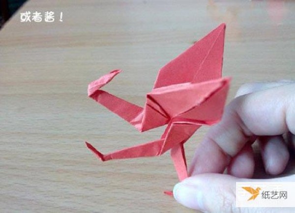 Illustrated steps on how to fold a wretched crane using origami