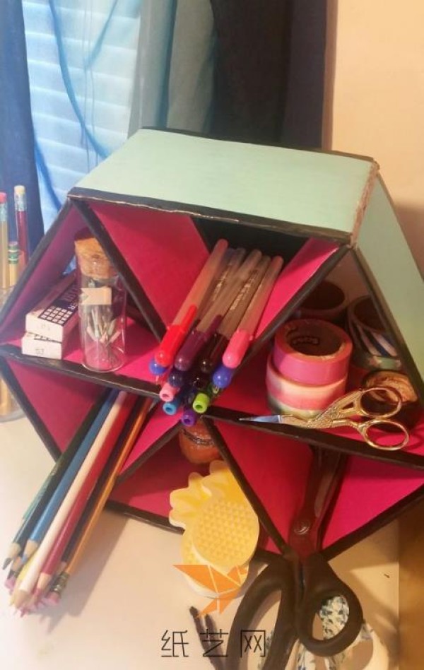 Hexagonal storage rack made from old cardboard waste