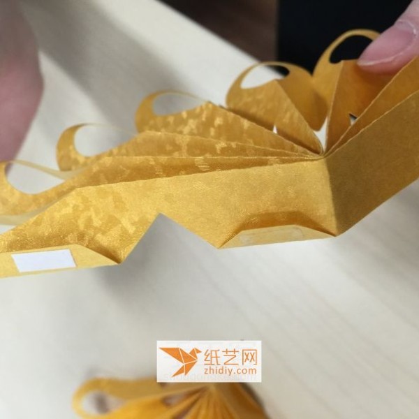 Tutorial on making paper-cut Gong Xi Fa Cai ornaments