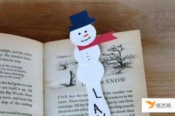 Illustrated tutorial on how to make a snowman bookmark using ice cream sticks