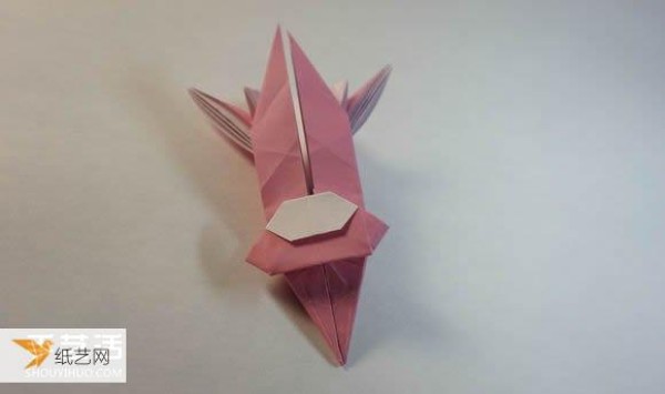 Illustrated step-by-step tutorial for girls using origami to fold something that looks complicated