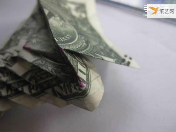 How to fold paper carp using dollars