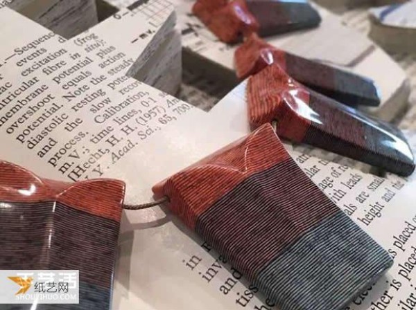 Jewelry with a taste of time made from old books and newspapers