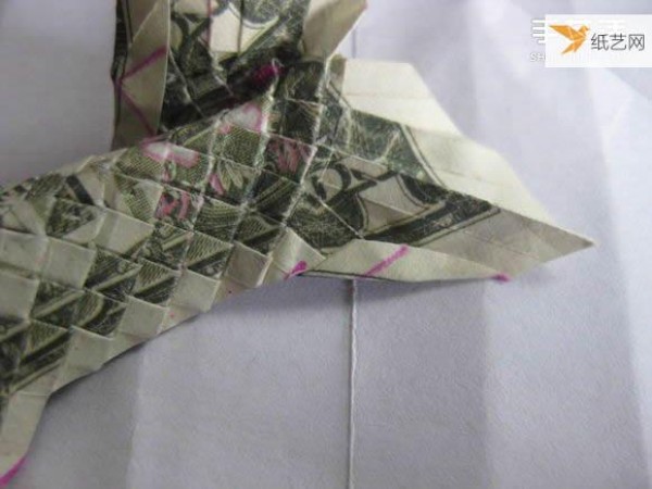 How to fold paper carp using dollars