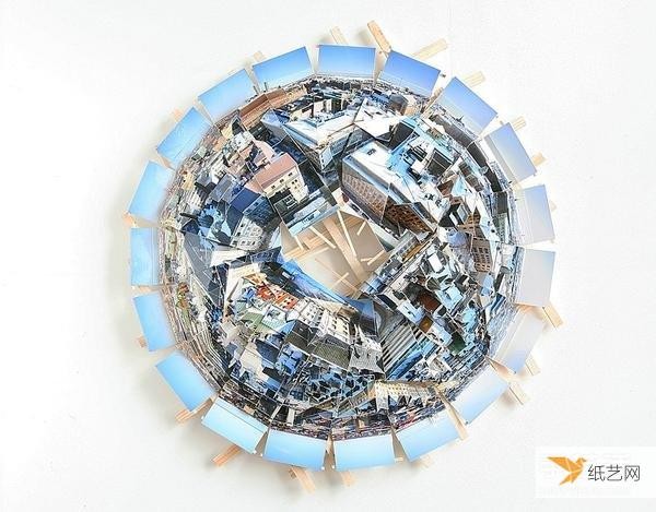 Three-dimensional city paper sculpture art: splicing multiple photos into a panoramic picture