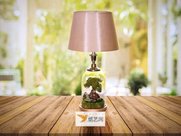 Beautiful glass jar table lamp that combines lamps with fairy tale scenes