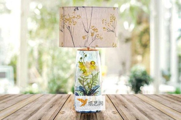 Beautiful glass jar table lamp that combines lamps with fairy tale scenes