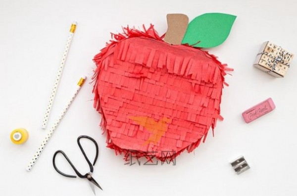 Turn waste into treasure by using old cartons to make Christmas paper apples