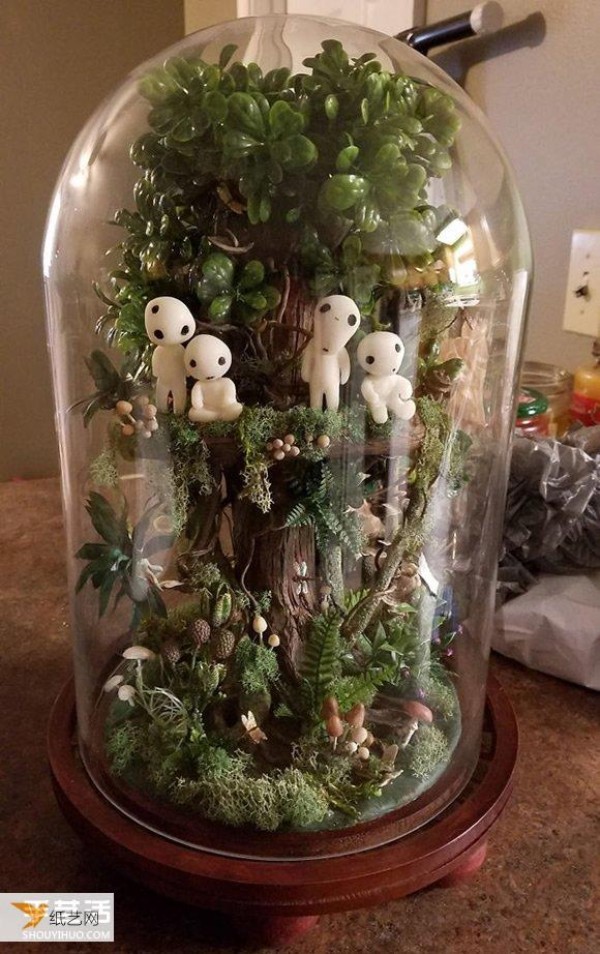 Mom’s birthday gift: a cute wood spirit garden in a glass dome