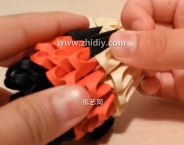 How to make an origami triangle Chinese doll