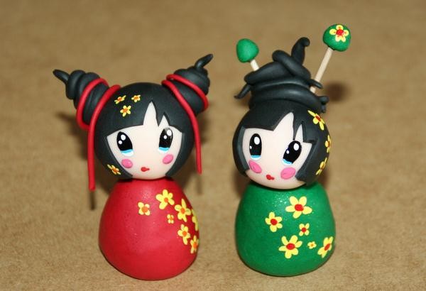 A pair of Chinese dolls made from ultra-light clay as a New Year gift