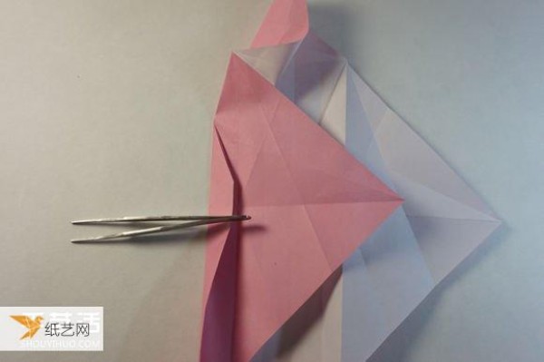 Illustrated step-by-step tutorial for girls using origami to fold something that looks complicated