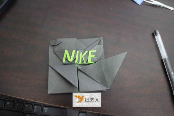 How to fold the Nike logo using origami