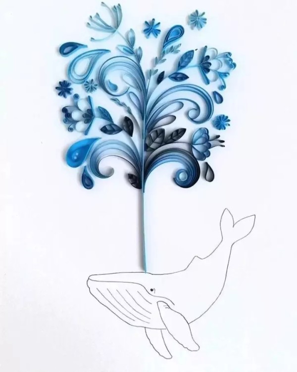 So beautiful! She combines paper quilling and flower arrangement!