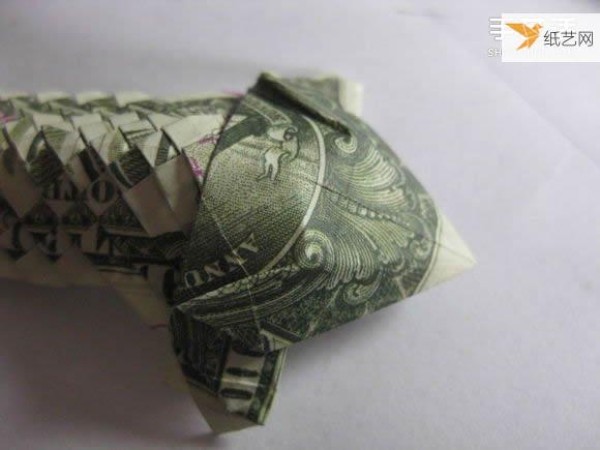 How to fold paper carp using dollars