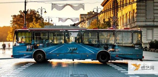 The disappearing trolleybus body advertisements have been transformed into interesting optical illusion art