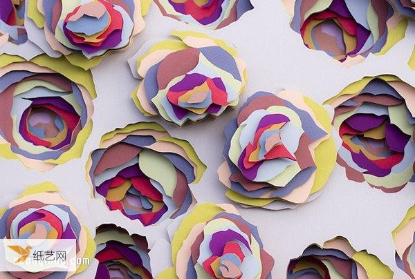 Stack up layers of colored cardboard to create a personalized and dreamy paper sculpture art