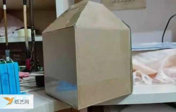 Specific steps for kindergarten children to use waste paper boxes to make a house by hand