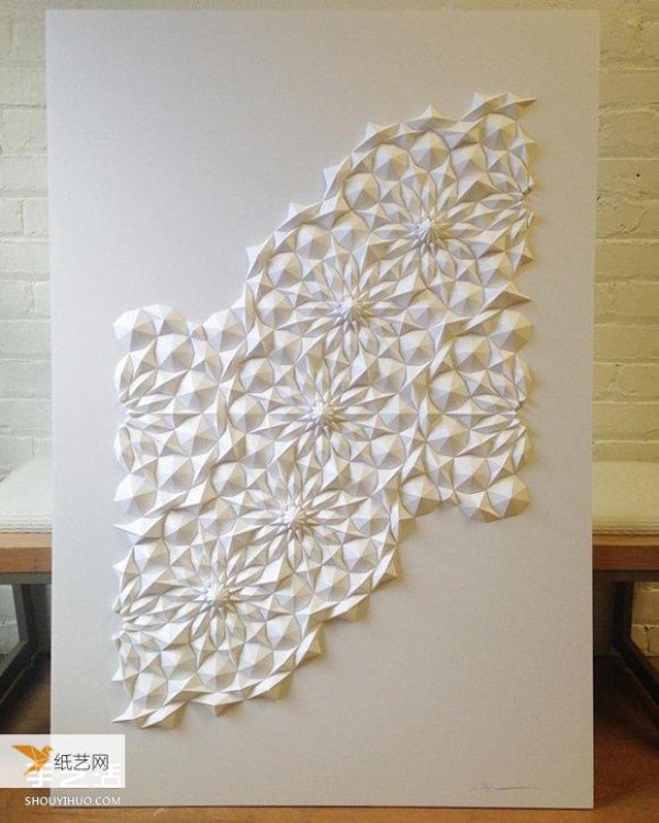 Appreciate the three-dimensional geometric paper sculptures made by truly challenging the limits of paper art.