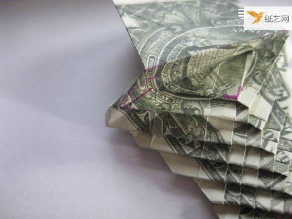 How to fold paper carp using dollars