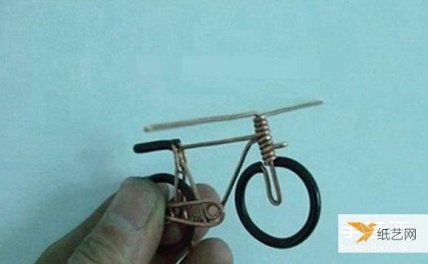 Illustrated tutorial on how to make a bicycle by hand using copper wire