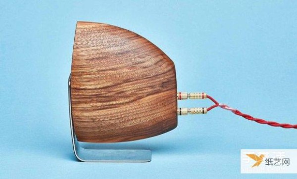 Hear the echo of the ocean with the wooden conch horn handmade by Grovemade