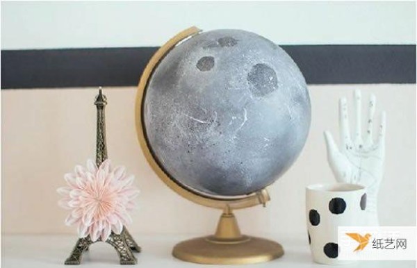 Illustrated tutorial on how to make a personalized globe transformed into a lunar ornament