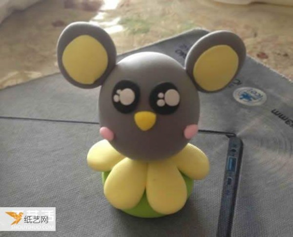 Find some picture tutorials for making personalized mice with ultra-light clay