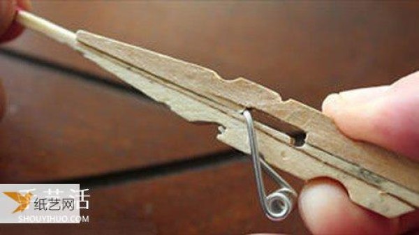 Use wooden clips to make your own personalized toy gun