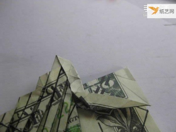 How to fold paper carp using dollars