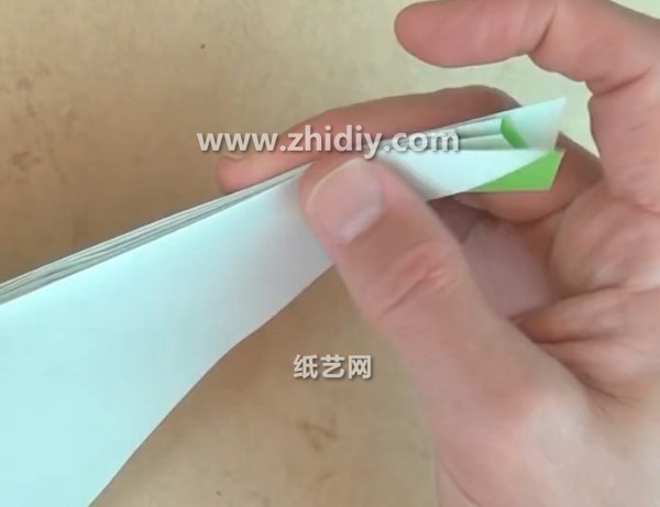 Tutorial on how to make a simple origami broom by hand