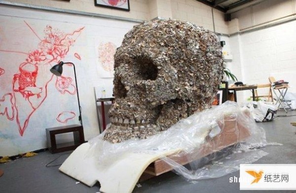 It took a year to use more than a thousand pieces of leather to create a colorful skull.