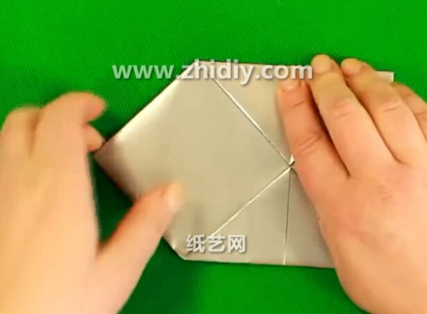 Origami video tutorial of simple origami ax for children