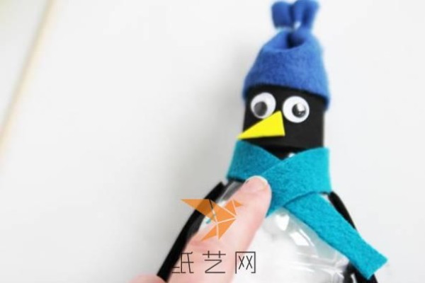 Tutorial for children to turn empty water bottles into treasures and make cute Antarctic penguins