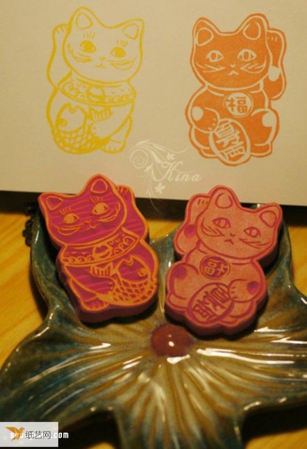 Cute lucky cat rubber stamp pattern that can bring good luck and wealth