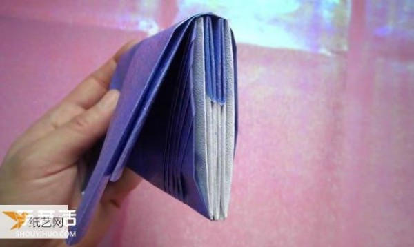 Simple illustration of a multi-layered wallet folded using origami