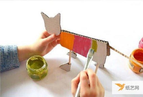 Illustrated tutorial on how to make a standing kitten by hand for children