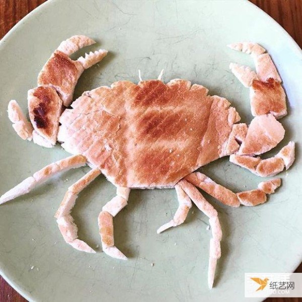 The bread carvings made by the loving father make his allergic daughter very happy to eat them