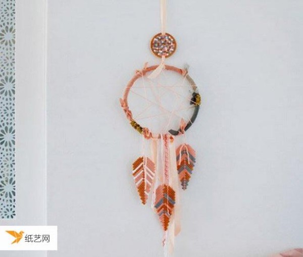 Illustrated tutorial on how to make a personalized beaded dream catcher using spelled beans