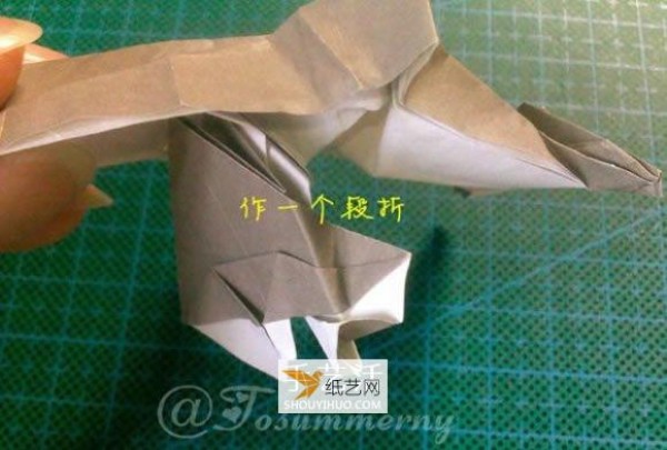 Illustration of how to prepare origami to fold Bugs Bunny