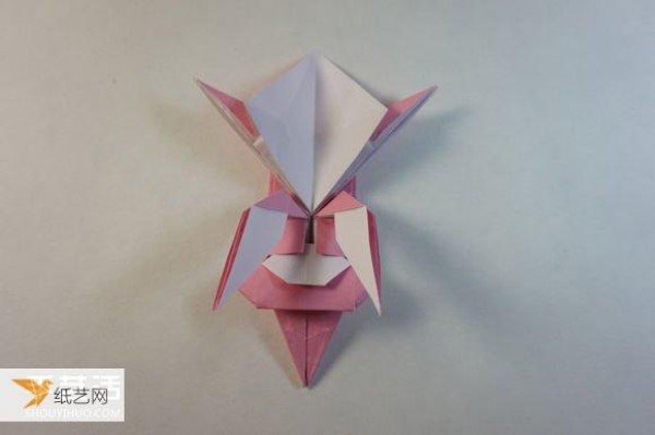 Illustrated step-by-step tutorial for girls using origami to fold something that looks complicated