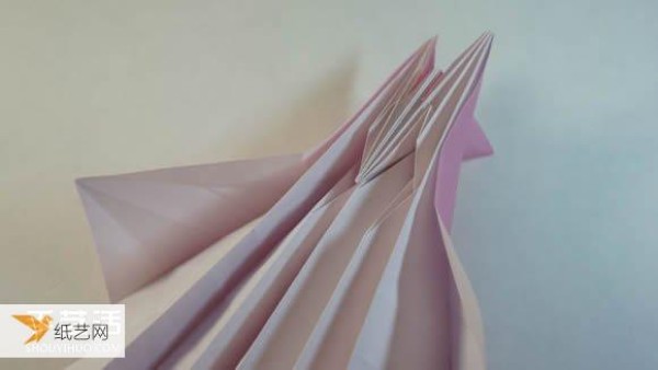 Illustrated step-by-step tutorial for girls using origami to fold something that looks complicated