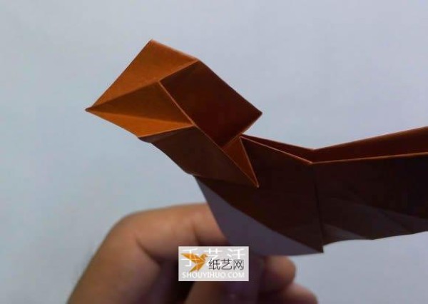 Detailed step-by-step illustration of folding hen