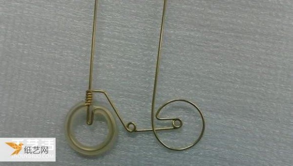 Illustrated tutorial for making a compact bicycle by hand using copper wire