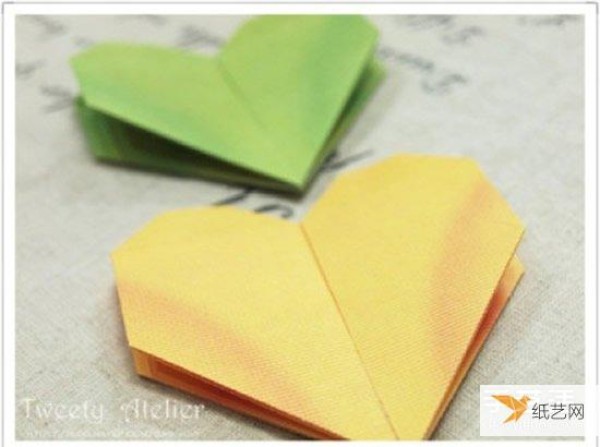 Step-by-step diagram of how to fold a double-layer heart that can be used as a seal on wedding invitations