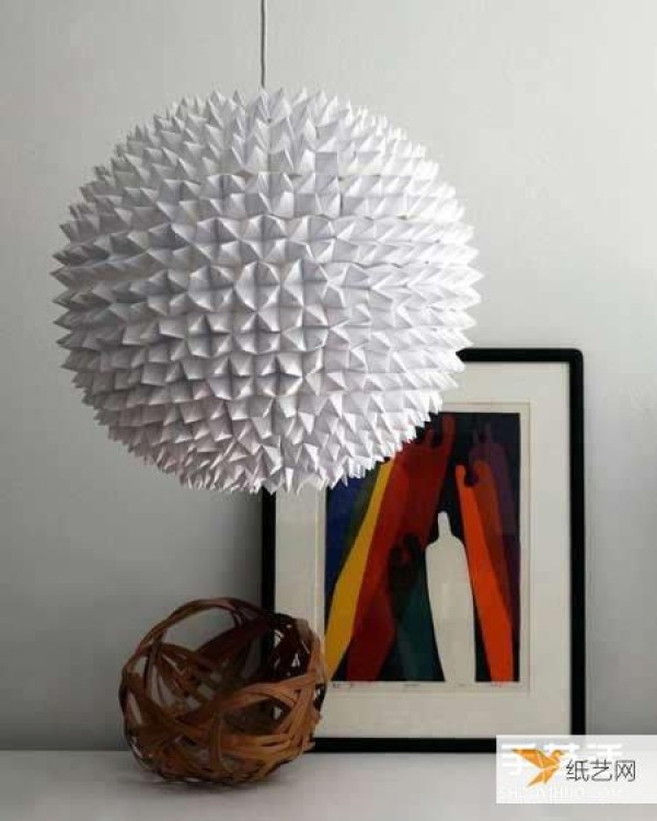 A beautiful origami chandelier lampshade made from hundreds of southeast and northwestern pieces