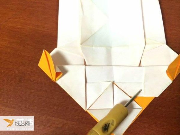 Illustrated tutorial that comprehensively demonstrates the method of hand-folding a paper sports car