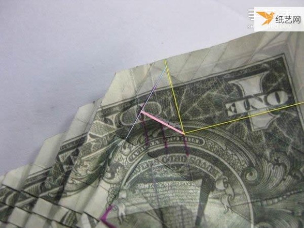 How to fold paper carp using dollars