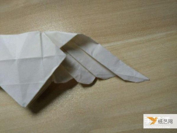 Illustration of the steps of origami with wings and flying heart